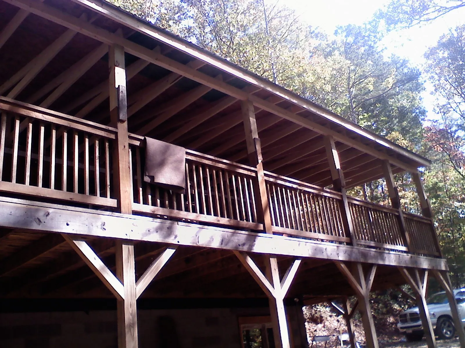 Timber framing under a new elevated porch and deck — Roof Leak Repair in Oakhurst by Roofing Brothers